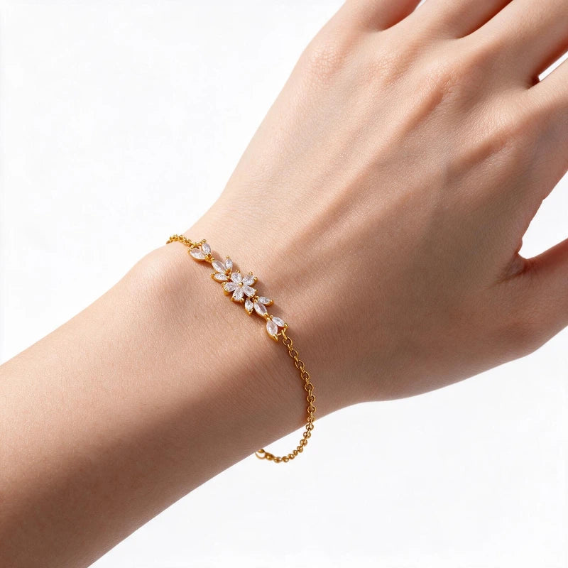 Bracelets for Women – Carmen Charms Bracelet, Golden Flower design, worn on wrist, white background