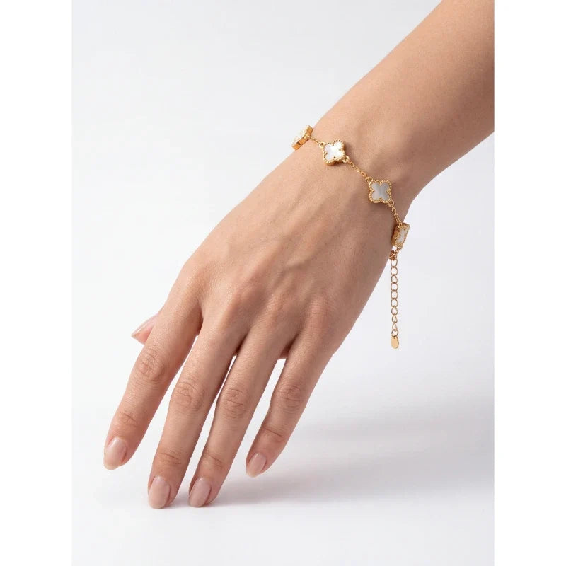 Bracelets for Women – Clovera Clover Bracelet worn on wrist, gold four-leaf clover links with mother-of-pearl inlay