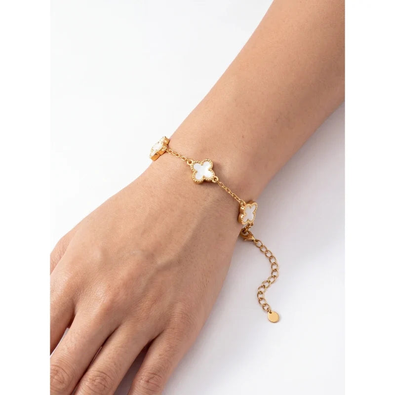 Bracelets for Women – Clovera Clover Bracelet close-up worn on wrist, gold clover charms with mother-of-pearl inlay