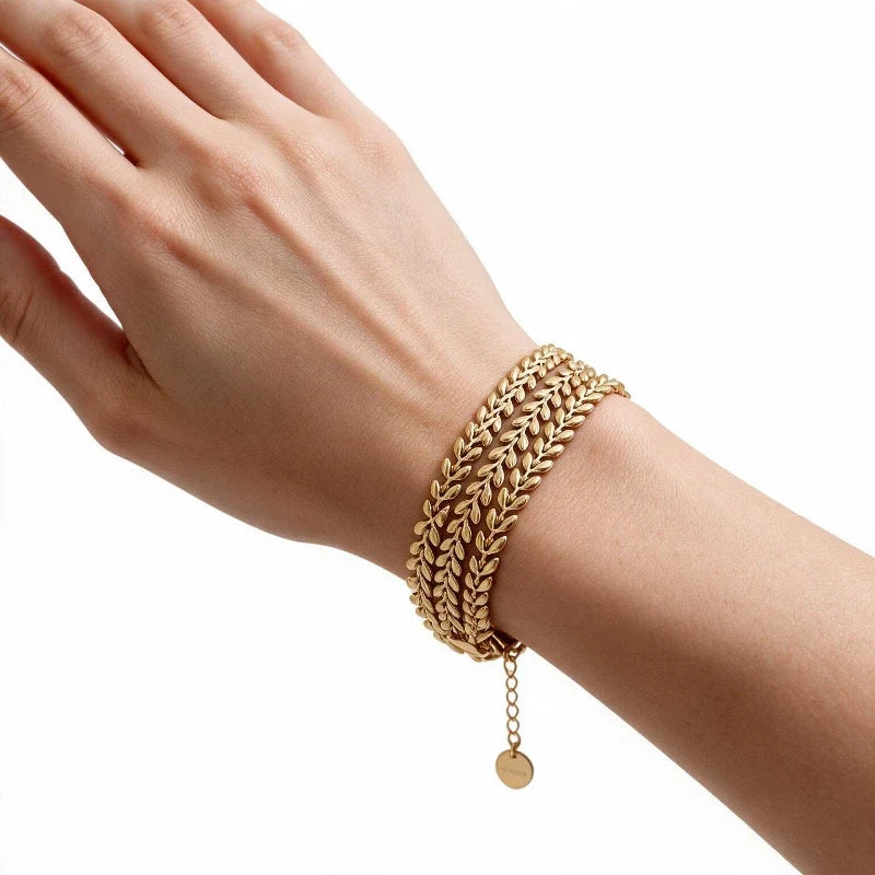 Bracelets for Women – Solenn Wheat Chain Bracelet worn on wrist, three-strand wheat chain detail, white background