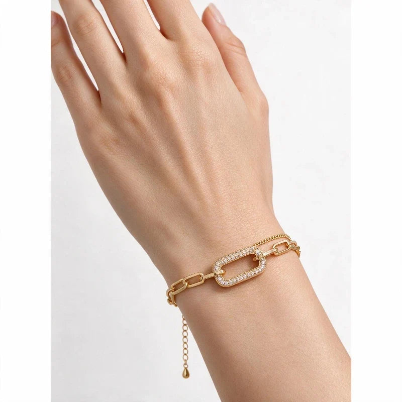 Bracelets for Women – Virella Geometric Gold Bracelet worn on wrist, 18k gold-plated paperclip chain with pavé rectangle link