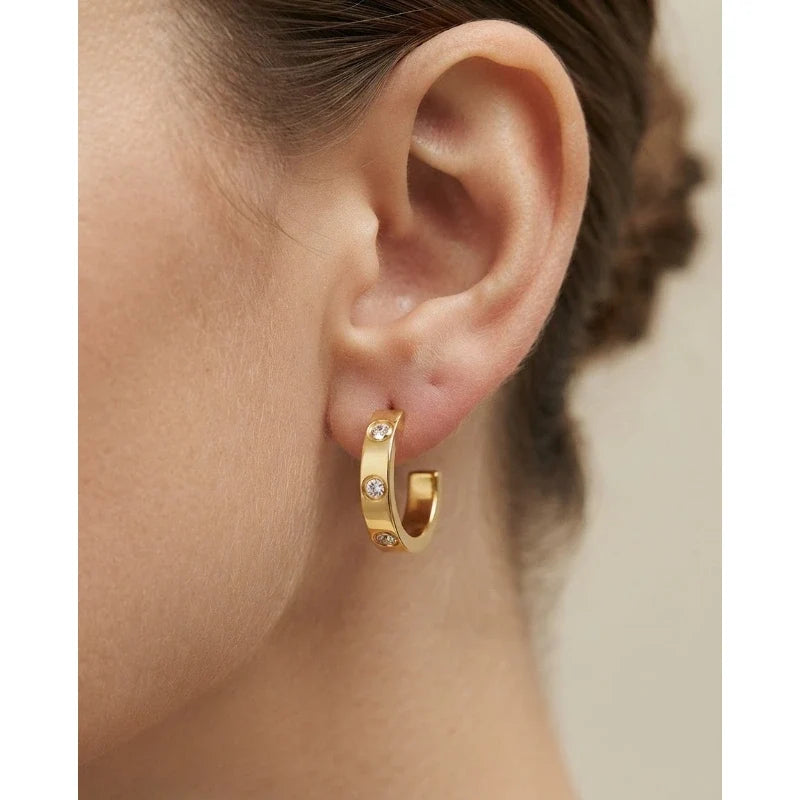 Mini CZ Diamond Hoop Earrings worn on ear