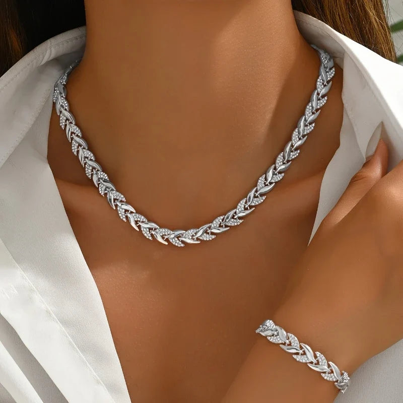 Model wearing Olivia silver braided necklace and bracelet