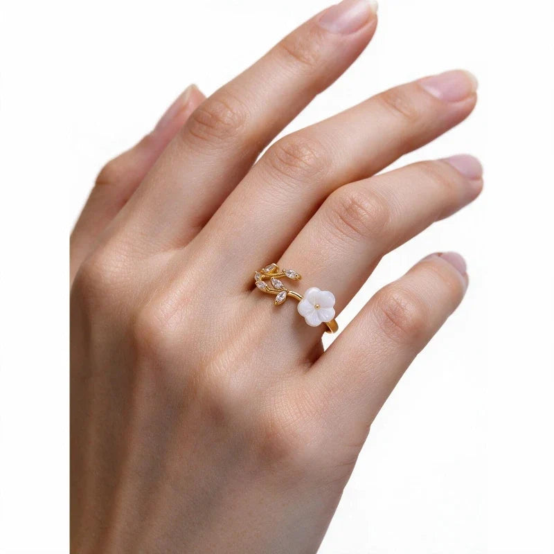 Woman wearing Women's Rings – Kaia Blossom Ring, close-up on white background